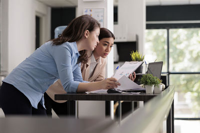 Business colleagues working in office