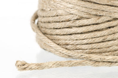 Close-up of rope on white background