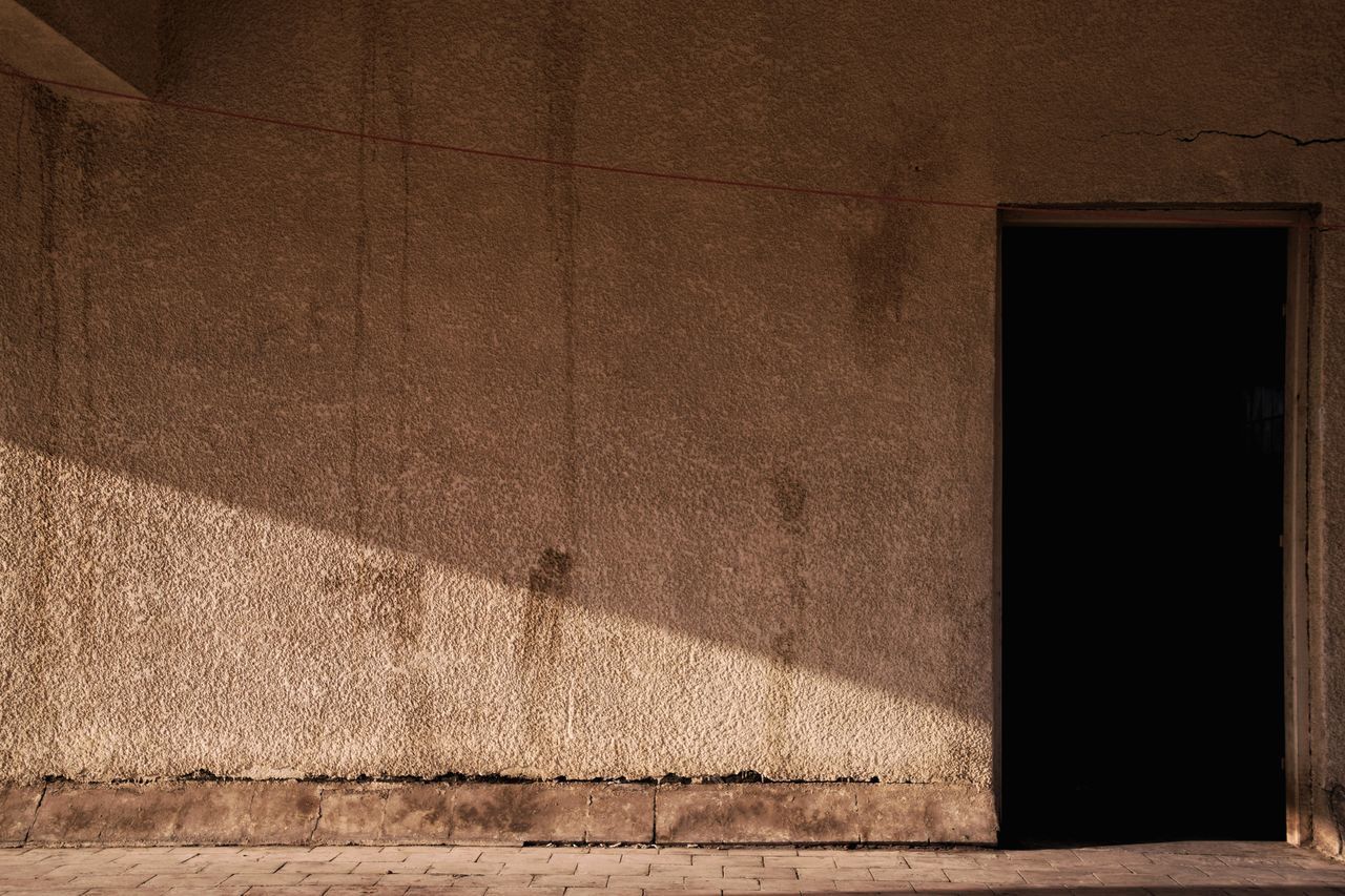 SHADOW OF OLD BUILDING