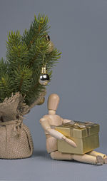 Christmas decorations on tree against white background