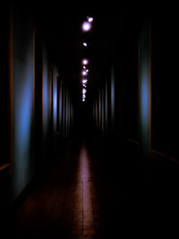 Empty corridor in dark room