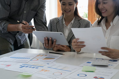 Business colleagues working at office