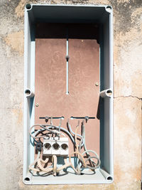 Close-up of shoes on wall