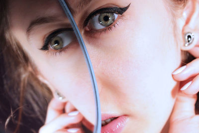 Cropped image of woman reflecting on mirror