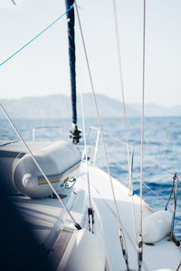 Boat sailing on sea against sky