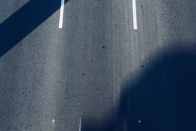 High angle view of road sign on street