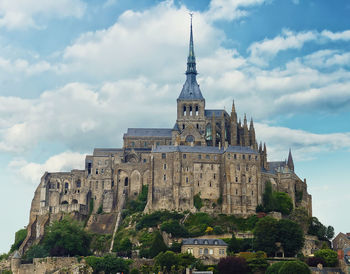 Low angle view of historical building against sky