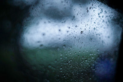 Full frame shot of wet glass window