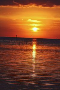 Scenic view of sea at sunset