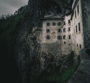 Low angle view of old building against sky