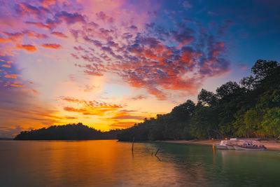 Scenic view of lake against sky during sunset in raja ampat west papua indonesia