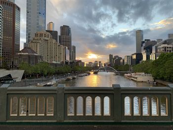 Buildings against sky during sunset