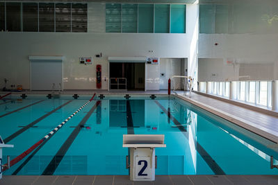 Reflection of building on swimming pool
