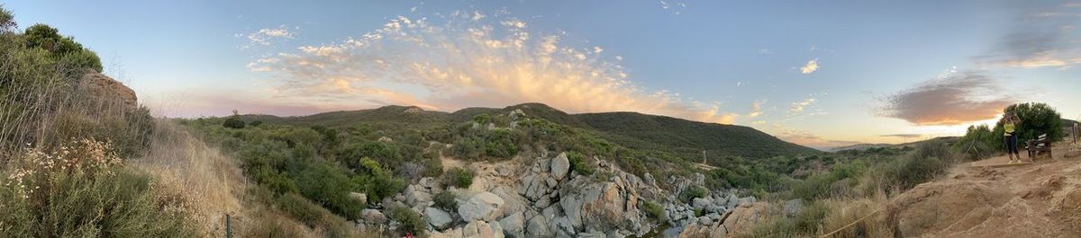 Panoramic view of landscape against sky during sunset