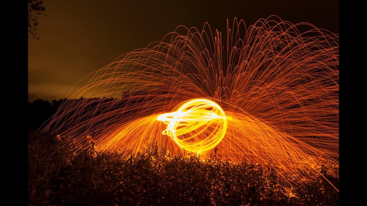 night, wire wool, long exposure, illuminated, motion, glowing, danger, heat - temperature, orange color, light painting, burning, speed, flame, outdoors, no people, nature, sky