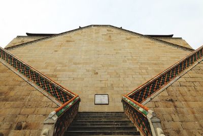 Low angle view of staircase against building