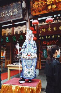 Statue of woman standing in temple