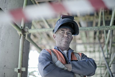 Portrait of man wearing hat looking away