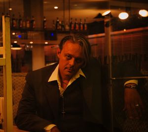 Portrait of mature siting in bar
