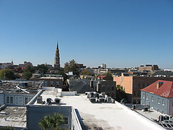 View of cityscape against blue sky