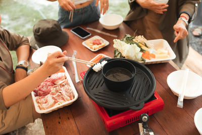 High angle view of people preparing food