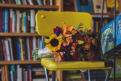 Close-up of yellow flower on table