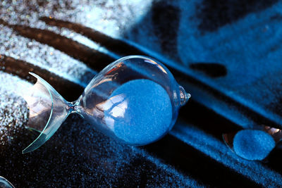 Close-up of crystal ball on glass