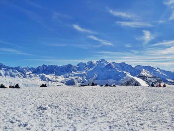 Scenic view of snowcapped mountains against sky