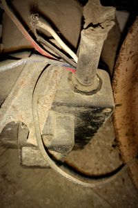 Low section of shoes on wet sand