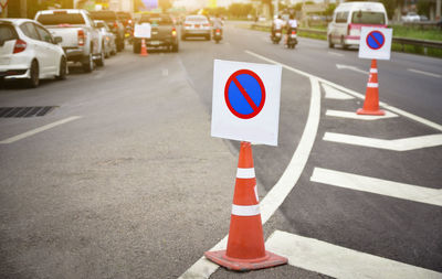 Road sign on street in city