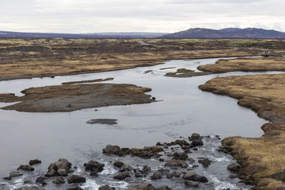 High angle view of the river and the valley with the mountains range