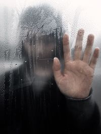 Close-up of water drops on glass window