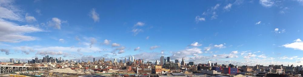 Panoramic view of buildings against sky