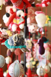 Close-up of stuffed toy hanging for sale in market