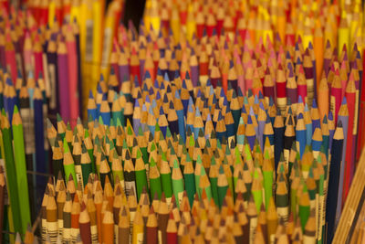 Close-up of multi colored pencils for sale