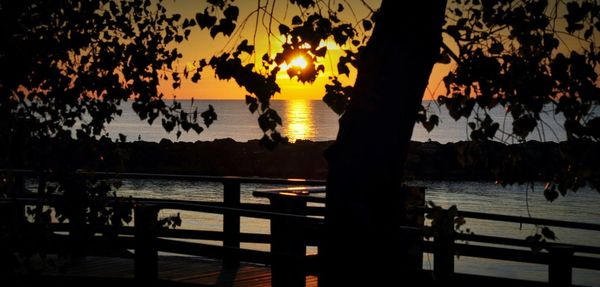 Scenic view of sea at sunset