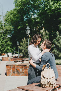 Couple sitting outdoors