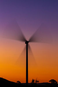 Silhouette built structure against sky during sunset