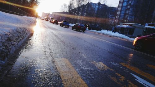 Cars on street in winter