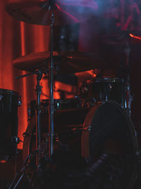 Man playing drum at night