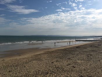 Scenic view of beach against sky