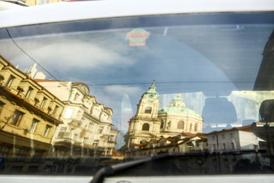 View of cathedral in city against sky