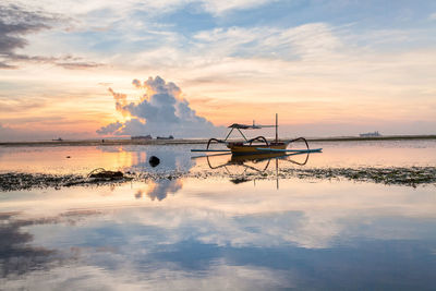 Scenic view of sea against dramatic sky