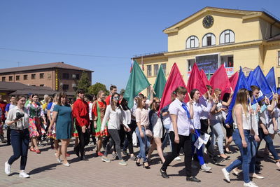 Group of people in front of building