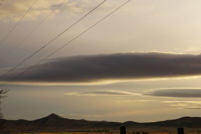 Low angle view of mountain against sky during sunset