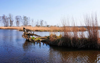 Scenic view of lake against clear sky