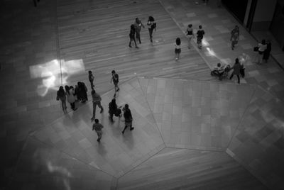 High angle view of people in corridor
