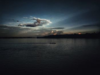 Scenic view of sea against sky at sunset