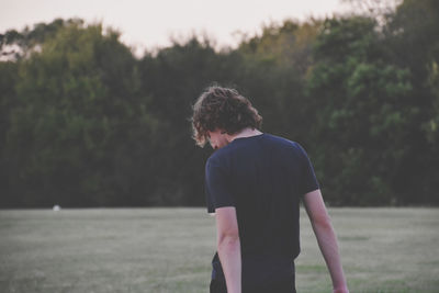 Teenage boy in field 