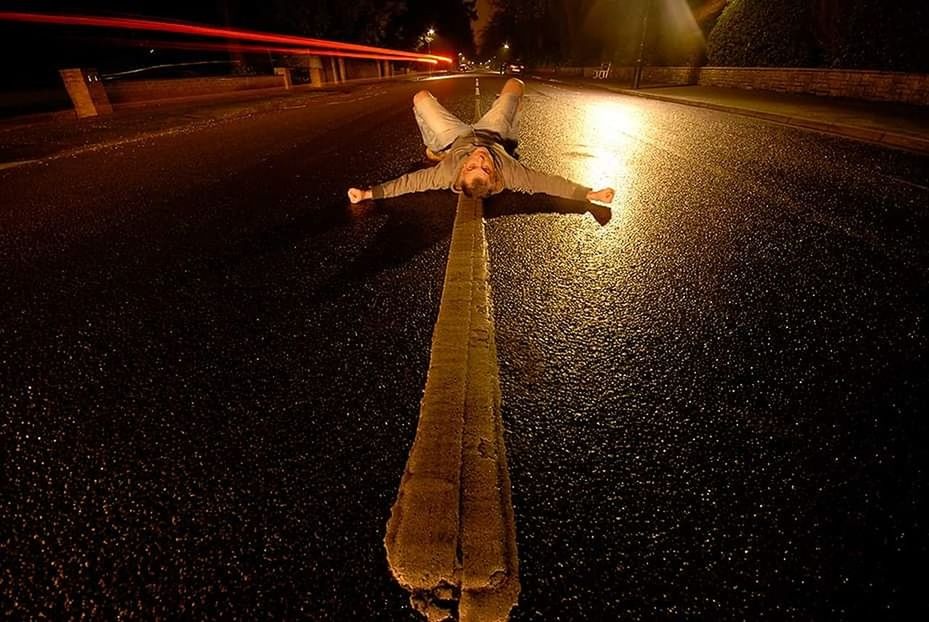 night, transportation, city, road, no people, illuminated, street, asphalt, nature, outdoors, high angle view, human representation, religion, representation, symbol, marking, motion, road marking, footpath